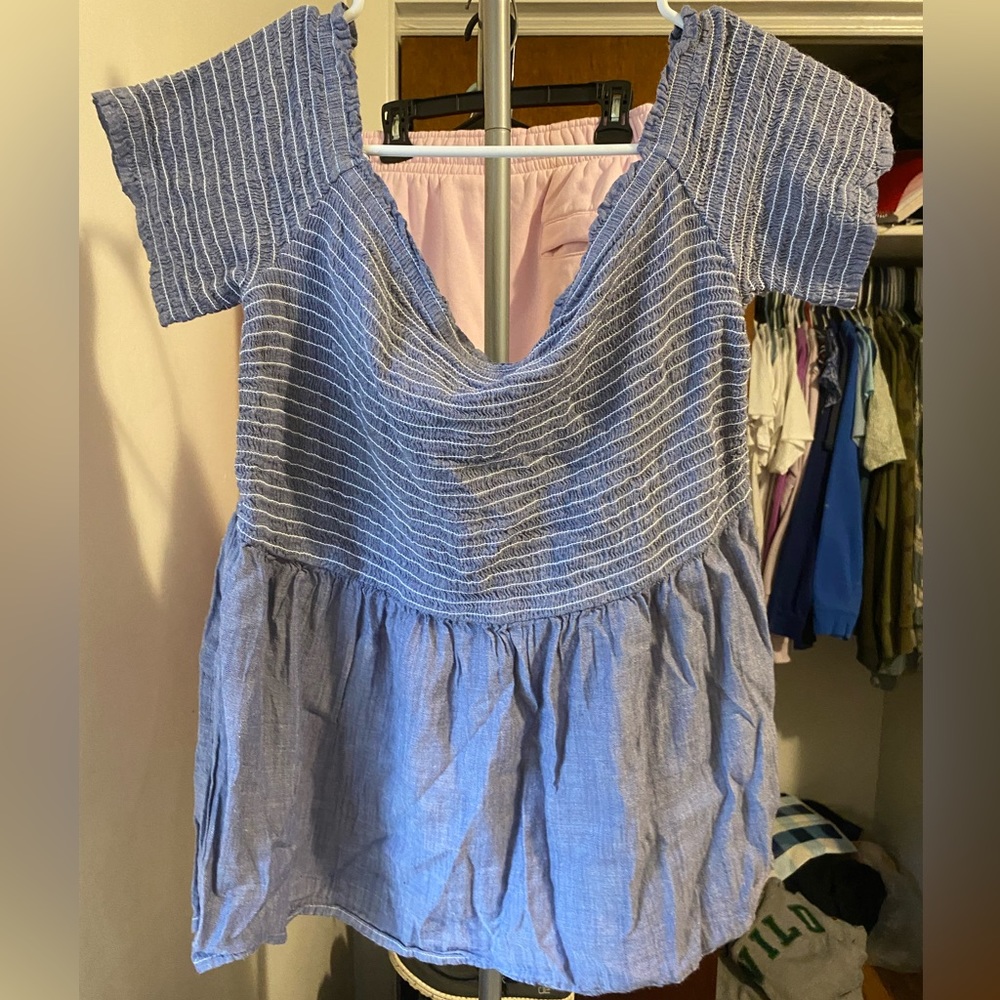 Blue shirts with white stripes